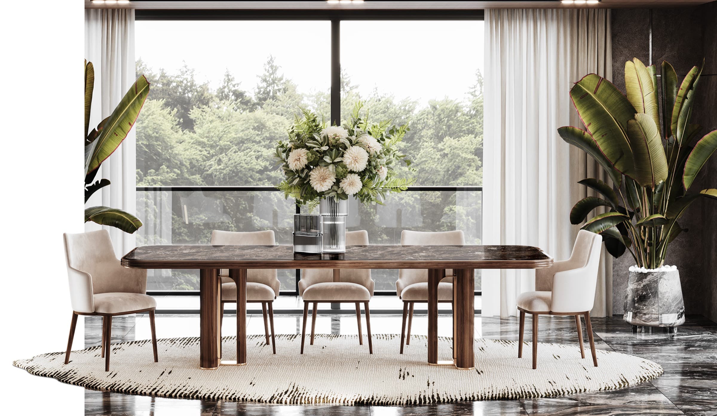 Valletta dining room — an oval brown marble table on a sculpted wood base with cream velvet chairs and a round fringed rug
